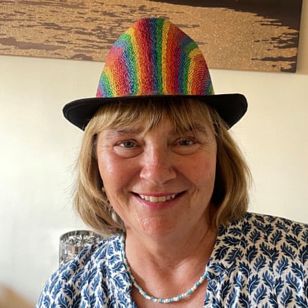 Tracey Lane wearing a rainbow party hat