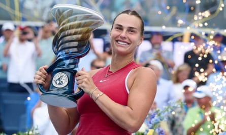 Aryna Sabalenka poses with the Rookwood Cup after defeating Jessica Pegula in the Cincinnati Open final