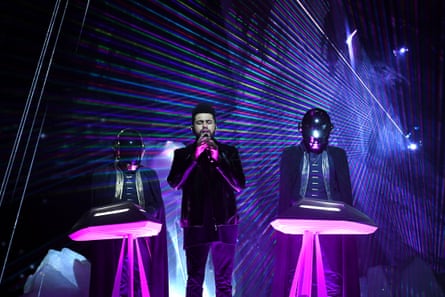 The Weeknd with Daft Punk at the Grammy awards in 2017.