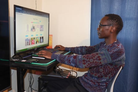 Oscar Oduor at a computer screen showing his missing people website