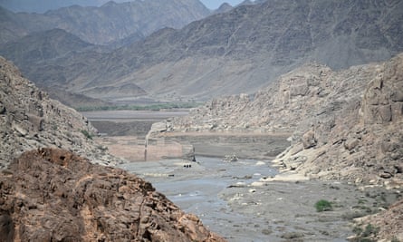 Flood surge in Sudan bursts dam, destroying villages and killing dozens