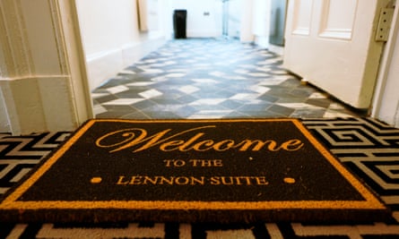 A welcome mat outside one of the suites that says ‘Welcome to the Lennon suite’