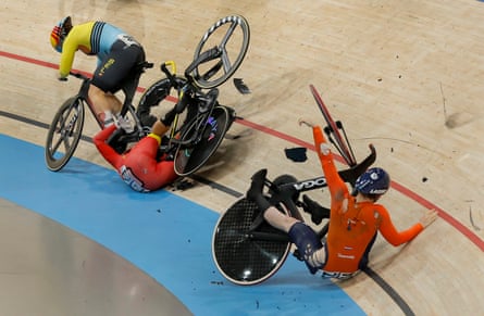 Belgium’s Nicky Degrendele (No 96), China’s Yuan Liying (bottom centre) and the Netherlands’ Steffie van der Peet (bottom right) crash during a women’s track cycling keirin quarter-final at the Saint-Quentin-en-Yvelines Velodrome