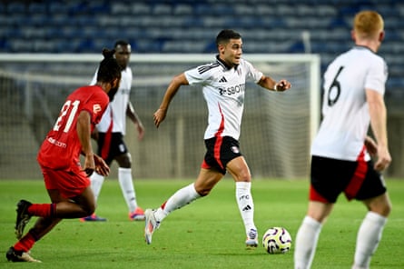 Andreas Pereira carries the ball in a pre-season game against Sevilla