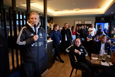 Savage takes to the microphone to address fans who are having food and drinks before the game in Bar Twenty Seven.