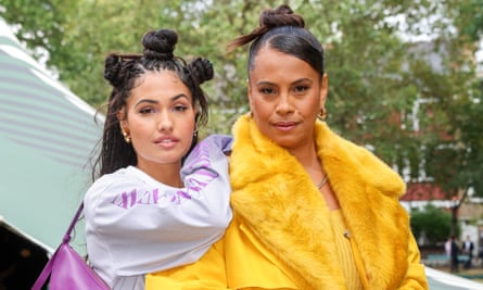 Neneh Cherry in a yellow coat with her daughter Mabel last year.