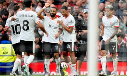 Liverpool celebrate during their victory over Manchester United