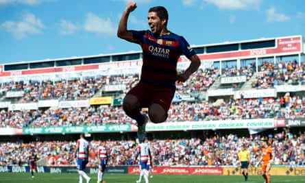 Luis Suárez celebrates scoring his team’s second goal during the match between Granada and Barcelona in May 2016.