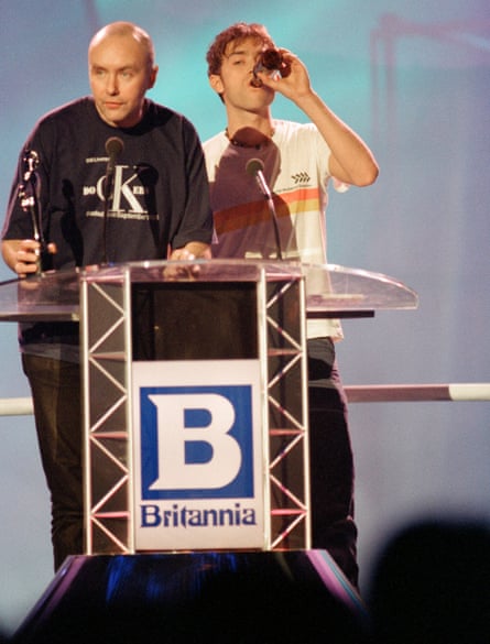 Irvine Welsh and Damon Albarn win the best soundtrack Brit award for Trainspotting in 1997.