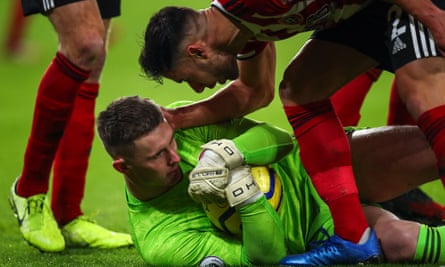 George Baldock celebrates with Dean Henderson during the Premier League match between Sheffield United and Manchester City at Bramall Lane on 21 January 2020