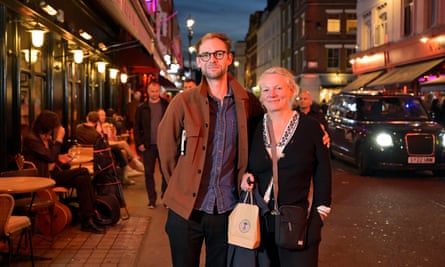 Customers Tom Gibbons and Natasha Chivers in Soho on Friday