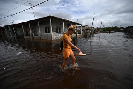 Cuba reels as Hurricane Rafael knocks out power grid and destroys homes