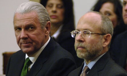 film still of two men in suits