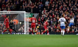 Liverpool back on top after Salah completes comeback win over Brighton