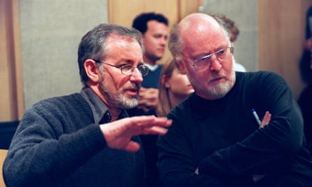 Steven Spielberg and John Williams confer (with Tom Hanks in the background) at Symphony Hall, Boston in 1998.