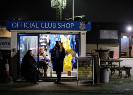 Staff waiting for customers at the club shop just before kick off in the National League Cup Group A match between Wealdstone and Southampton Under 21s.