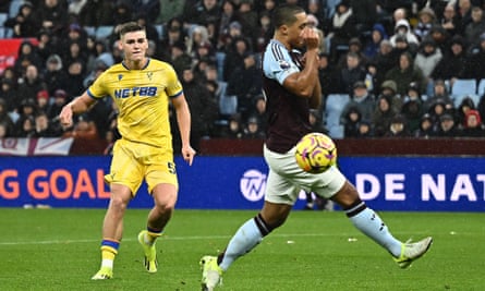 Justin Devenny shoots past Youri Tielemans to score Crystal Palace’s second goal at Aston Villa.