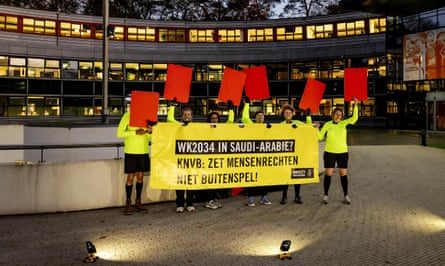 Activists from Amnesty International rally against Saudi Arabia’s World Cup bid at the Dutch FA’s headquarters.