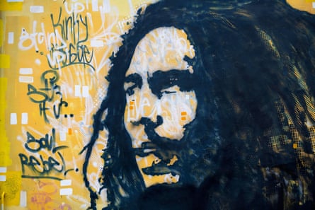 A mural of Bob Marley on a wall outside Tuff Gong studio