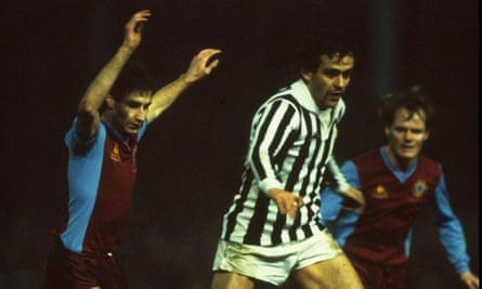 Michel Platini of Juventus is shadowed by Aston Villa’s Andy Blair during the 1983 European Cup quarter-final at Villa Park.