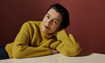 Olivia Williams wearing a yellow jumper