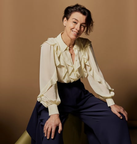 olivia williams wears a cream blouse