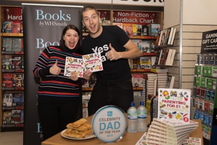 Mark and Roxanne at the signing for their Parenting for £1 book, in 2018