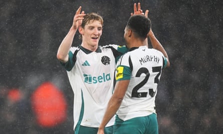 Jacob Murphy celebrates his goal with Anthony Gordon, the provider