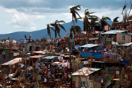 Damaged tin-roof shacks