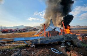 Jeju Air crash: almost all presumed dead after South Korean aircraft veers off runway and hits wall