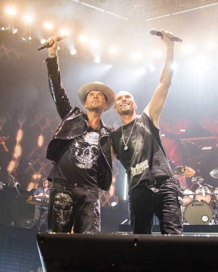 The brothers on stage together in the documentary After the Screaming Stops.