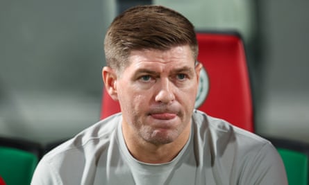 Steven Gerrard looks on