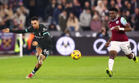 Trent Alexander-Arnold of Liverpool chased by Mohammed Kudus of West Ham