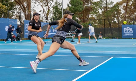 Danni-Elle Townsend and Michelle Esquivel playing doubles at a Major League Pickleball event