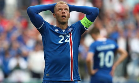 Eidur Gudjohnsen of Iceland holds his head in his hands during Euro 2016.