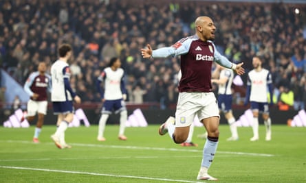 Donyell Malen celebrates a goal against Spurs.