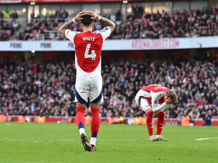 Arsenal players react to their defeat by West Ham.