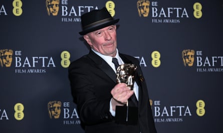 Audiard with his Bafta for best film not in the English language