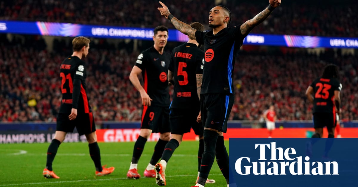 Raphinha strike and Szczesny saves help 10-man Barcelona edge Benfica