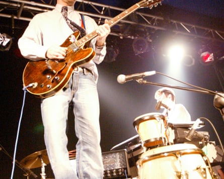 Quite Spinal Tap … Steve Mason on stage with the band in 2004.