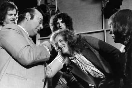 Action! … Johnny Shannon punches Holder.