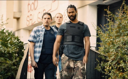three men walking outside