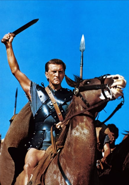 a man on a horse with a sword raised