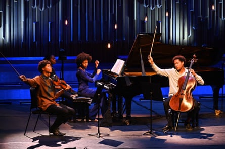 Isata Kanneh-Mason piano, Braimah Kanneh-Mason violin and Sheku Kanneh-Mason perform at the Barbican, London in October 2020.