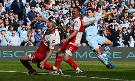 Sergio Agüero watches his shot fly in late on against QPR in May 2012 to seal Manchester City’s first Premier League title